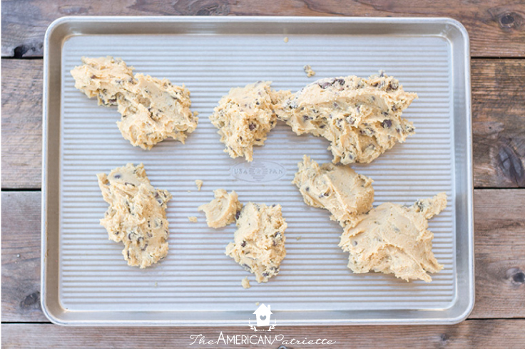 chocolate chip Texas cookies lumps of dough on cookie pan