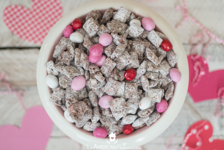 Strawberry Nutella Valentine's Puppy Chow (also known as Muddy Buddies) - delicious and easy-to-make sweet treat for Valentine's Day!