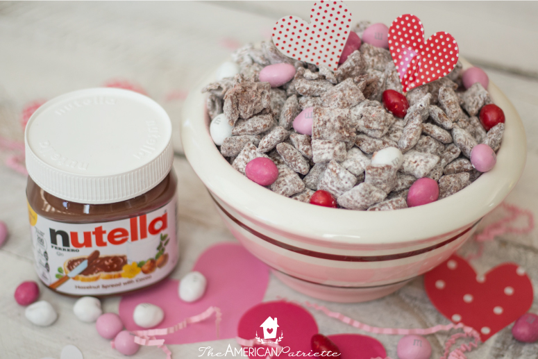 Strawberry Nutella Valentine's Puppy Chow (also known as Muddy Buddies) - delicious and easy-to-make sweet treat for Valentine's Day!