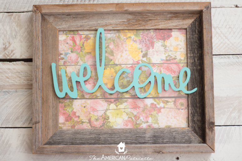 Colorful DIY Welcome Sign Using a Repurposed Frame - A super easy and ADORABLE DIY project that helps welcome guests into your home!