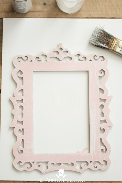 DIY Framed Monogram Sign - An easy, budget-friendly gift idea or piece of lovely home decor for your entryway, a baby's nursery, or piece for a gallery wall! You can completely customize this project by changing up the paint colors and scrapbook paper. 