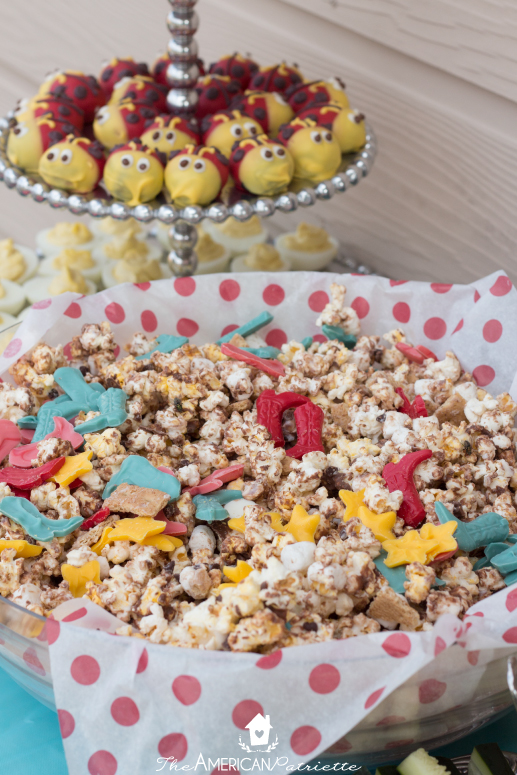 Easy Smores Popcorn Recipe - An easy-to-make, no-bake sweet treat for a party or get-together! Cute addition to a camping-themed party! 